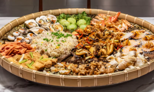 海鲜捞饭推荐几家？潮汕人家海味捞饭鲜香味美，海鲜盖饭适合家庭用餐